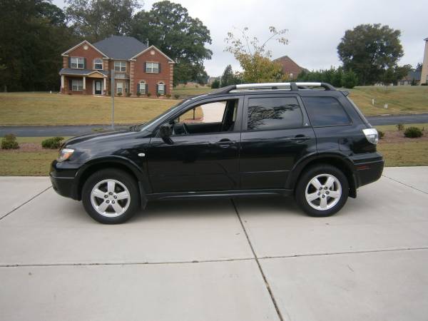 2007 mitsubishi outlander limited 4cyl awd 1 owner (160K) hwy miles for sale in Riverdale, GA – photo 2