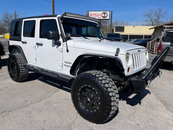 2013 Jeep Wrangler Unlimited Sport 4x4 4dr SUV EVERYONE IS APPROVED! for sale in San Antonio, TX