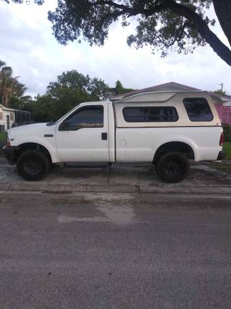 2002 f250 single Cab PkUp Truck With Leer Camper Top for sale in Miami, FL