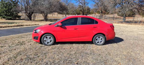 2014 Red Chevy Sonic highway miles for sale in Guthrie, OK