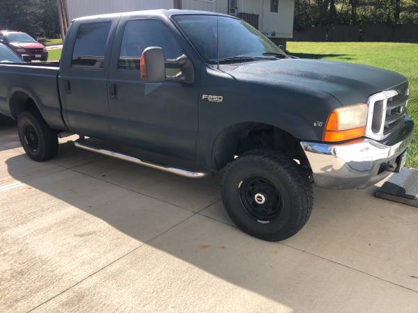 99 F250 3/4 Ton V10 4x4 GREEN RAPTOR Liner Sprayed w/DESIGNED TAILGATE for sale in Sioux City, IA – photo 3