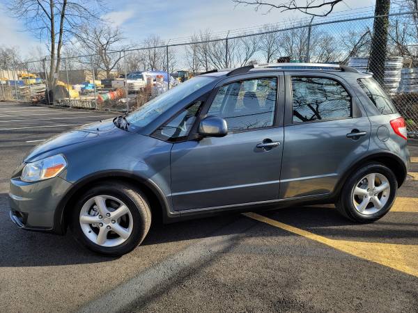 2009 SUZUKI SX4 TOURING AWD CROSSOVER! LOW MILES! 1 OWNER! - cars & for sale in Hasbrouck Heights, NJ