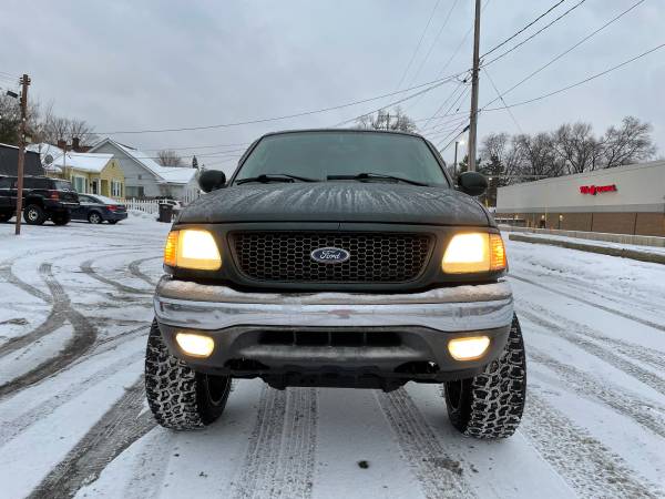 2003 Ford F-150 Supercrew Lariat LIFTED NEW TIRES - cars & for sale in Wyoming , MI – photo 2