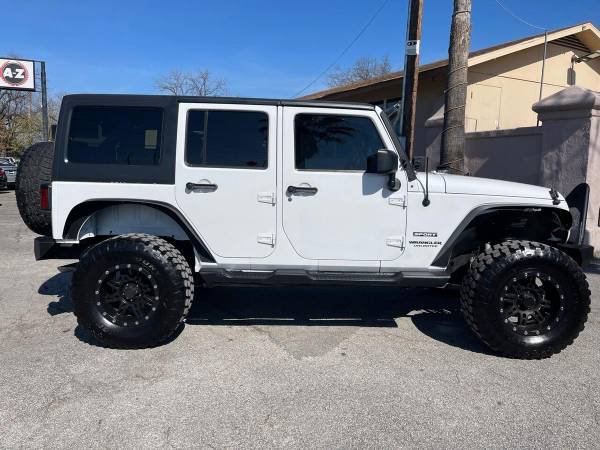 2013 Jeep Wrangler Unlimited Sport 4x4 4dr SUV EVERYONE IS APPROVED! for sale in San Antonio, TX – photo 8