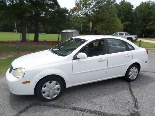 2008 SUZUKI FORENZA**99K MILES/READY TO GO** - cars & trucks - by... for sale in Kinston, NC