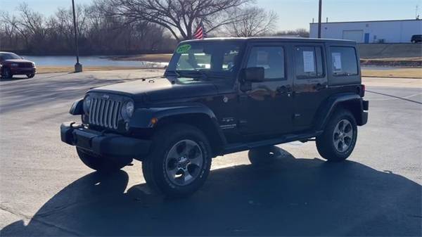 2017 Jeep Wrangler Unlimited Sahara suv Black Clearcoat - cars & for sale in Augusta, KS – photo 5