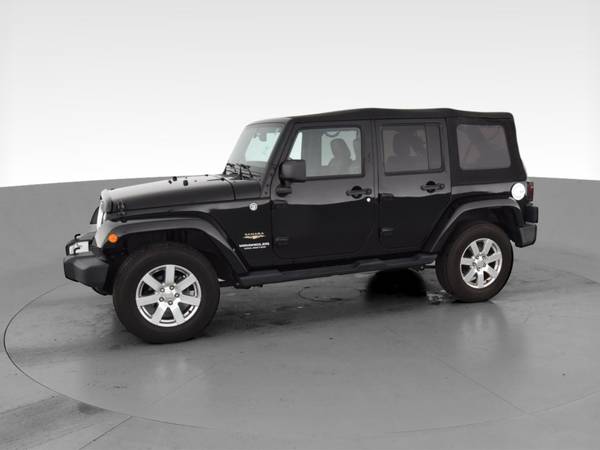 2013 Jeep Wrangler Unlimited Sahara Sport Utility 4D suv Black - -... for sale in Bakersfield, CA – photo 4