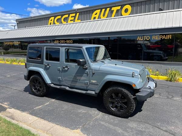 2014 Jeep Wrangler SAHARA - - by dealer - vehicle for sale in Holland , MI