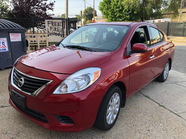 2014 Nissan Versa SV 75k miles Clean title Paid off red/blk for sale in Baldwin, NY – photo 2