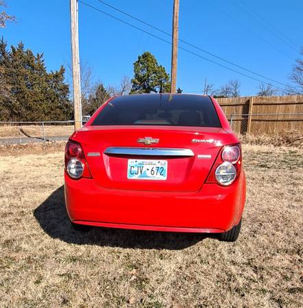 2014 Red Chevy Sonic highway miles for sale in Guthrie, OK – photo 3
