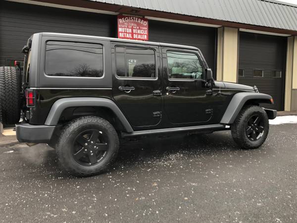 2016 Jeep Wrangler Unlimited Black Bear - - by dealer for sale in Rushville, NY – photo 4