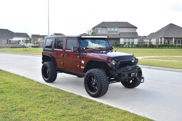 Lifted 2009 Jeep Wrangler Unlimited for sale in Rosharon, TX – photo 4