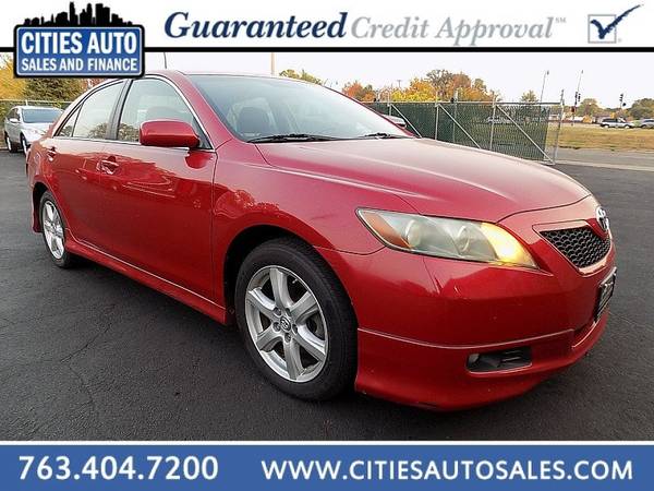 2007 *Toyota* *Camry* *4d Sedan LE Auto* RED - cars & trucks - by... for sale in Crystal, MN