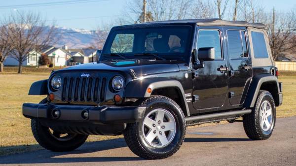 2012 Jeep Wrangler 4x4 4WD Unlimited Sport SUV - cars & trucks - by... for sale in Boise, ID