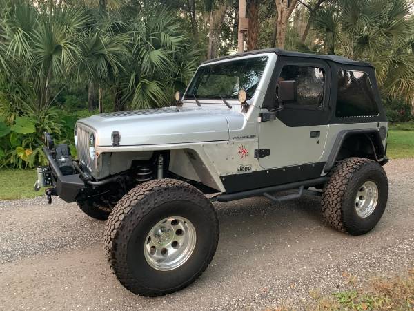 Over the top 2002 Jeep Wrangler TJ - cars & trucks - by owner -... for sale in Mims, FL
