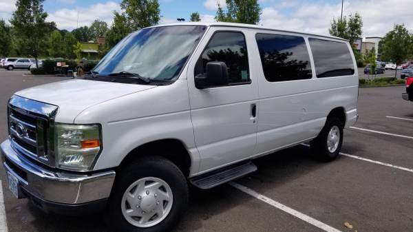 White Ford E350 12 Passenger Van - cars & trucks - by owner -... for sale in Hillsboro, OR