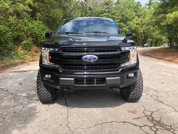 2018 Ford F150 Lariat SuperCrew 5.5-ft. Bed 4WD pickup Black for sale in Fayetteville, AR – photo 2
