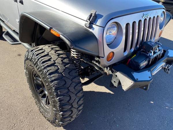 2013 Jeep Wrangler Unlimited - cars & trucks - by dealer - vehicle... for sale in Brighton, WY – photo 18
